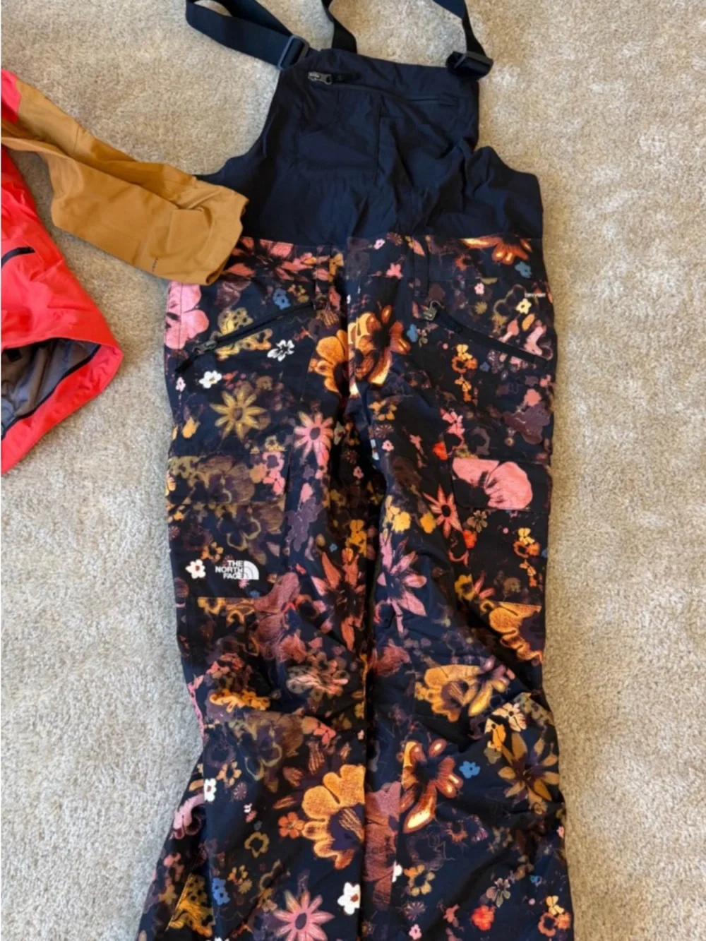 The North Face Black Floral Snow Bibs with Orange & Pink Accents - Picture 7 of 10